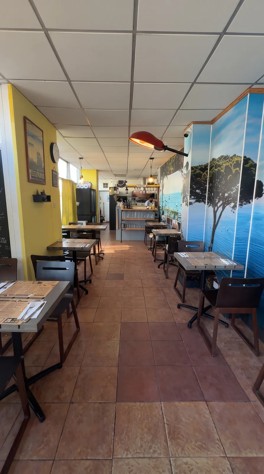 Basilico dining room prepared for restaurant guests